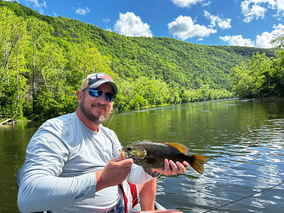 a young man fly fishing virginia waters