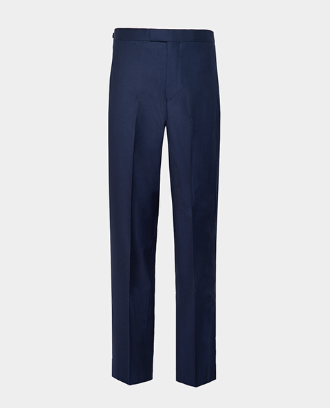 A navy twill tuxedo pants, non pleated, slim leg profile ghost shot on a light grey background.