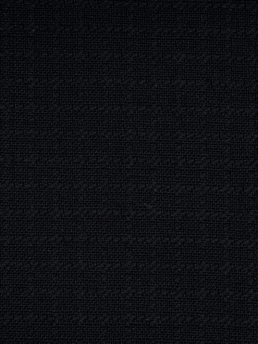 The black jacquard suit fabric close up shot.