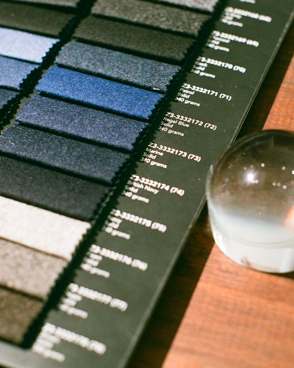 Close-up of an array of custom suit fabric swatches.