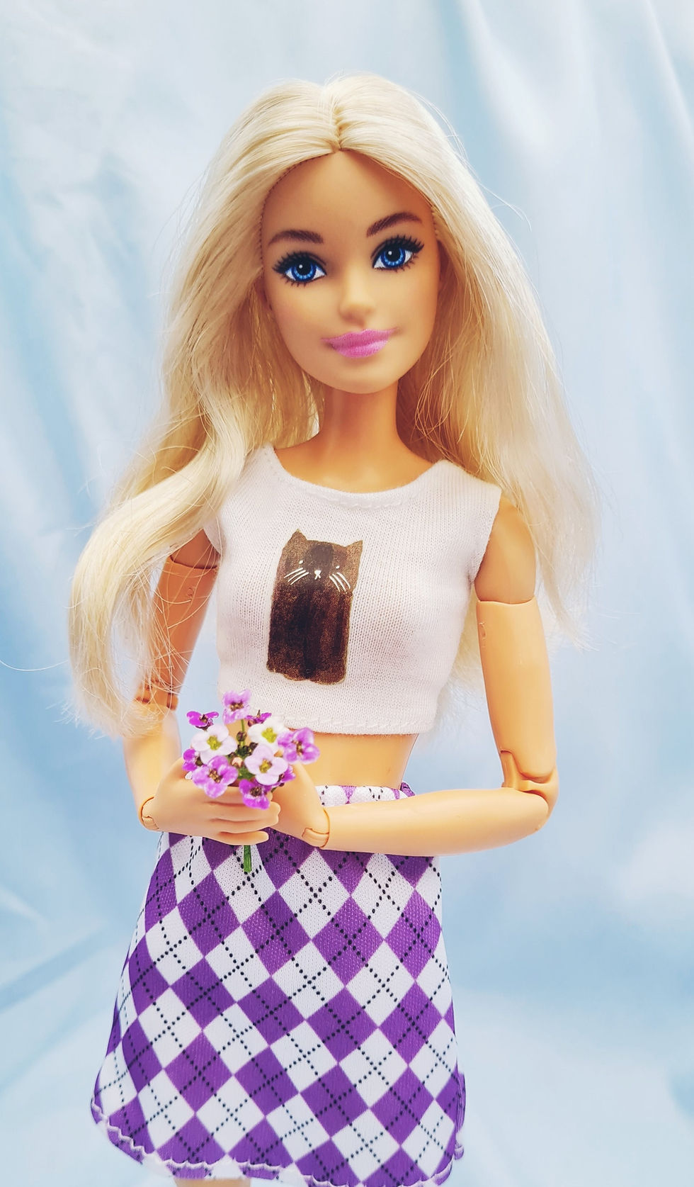 Thumbnail: Barbie wearing a Kitten Crop White Tank Top