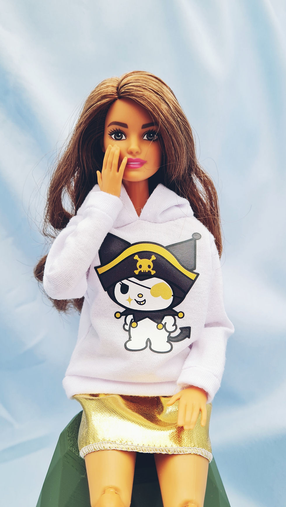 Thumbnail: Barbie is wearing a High Seas Sanrio Hoodie sweatshirt