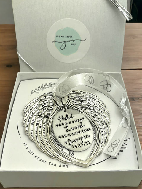 angel wing charm with white silk ribbon with silver hearts hand stamped charm with infant loss memorial information