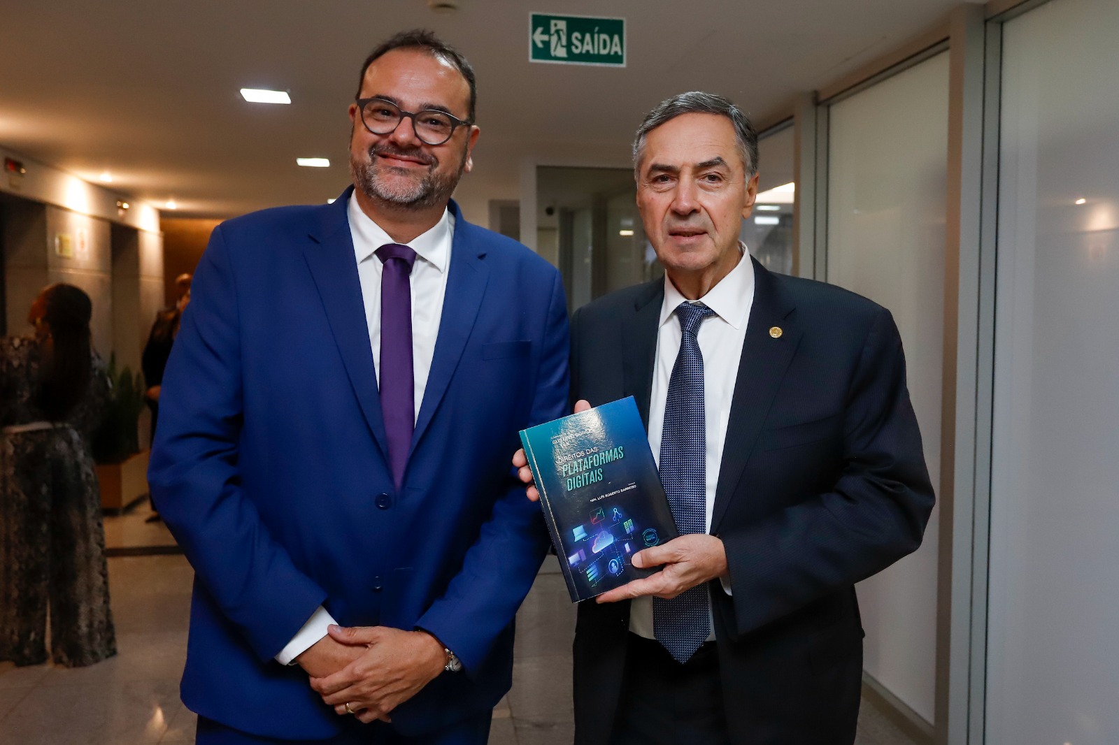 LABSUL HANDS A COPY OF THE BOOK IT IS LAUNCHING TO MINISTER LUÍS ROBERTO BARROSO