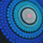 Detail of the black and blue mandala round