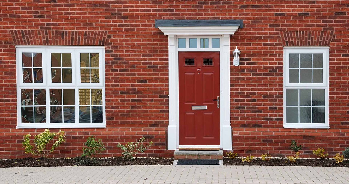 door on red brick house