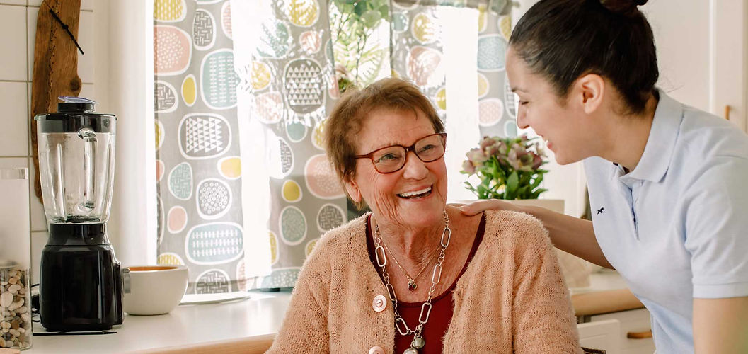 elderly lady at home with careworker