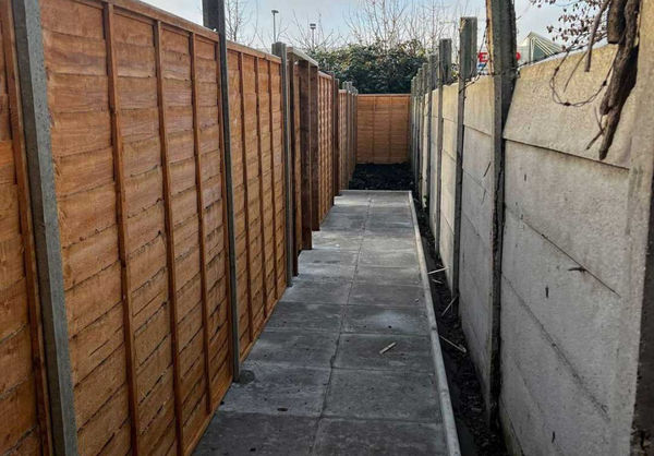 Paved area between two fenced