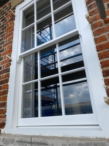 Traditional sash window modernised with uPVC