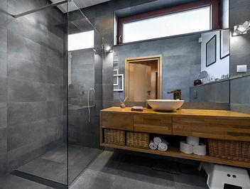 Modern interior design - bathroom in gray and wooden finishing