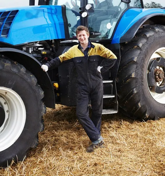 agricultural worker and tractor