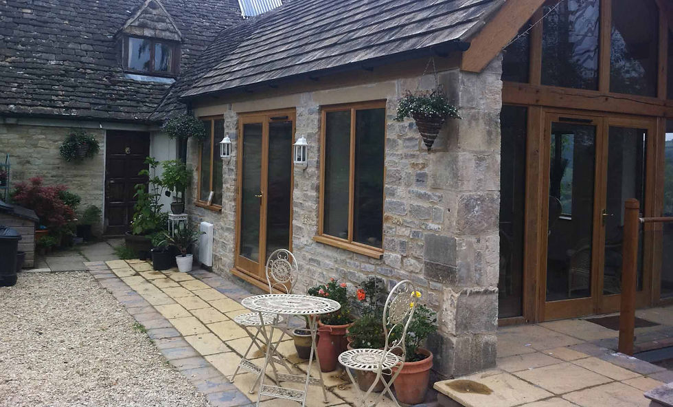 bungalow with stone walls and French doors