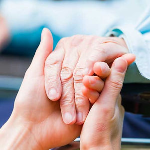 Young carer giving helping hands for the elderly woman