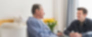 Caucasian son visiting father in hospital