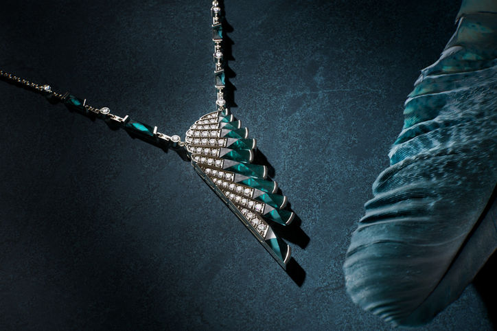 Garrard wing necklace with a sculpted feather background