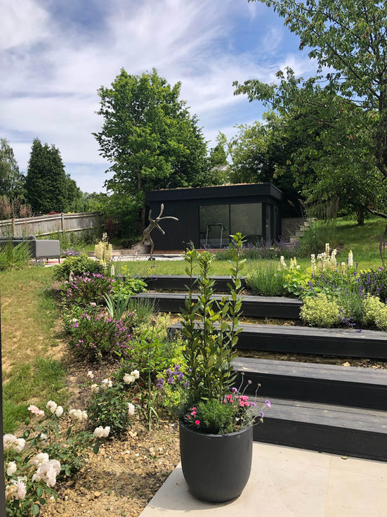 Garden steps leading to pool house.