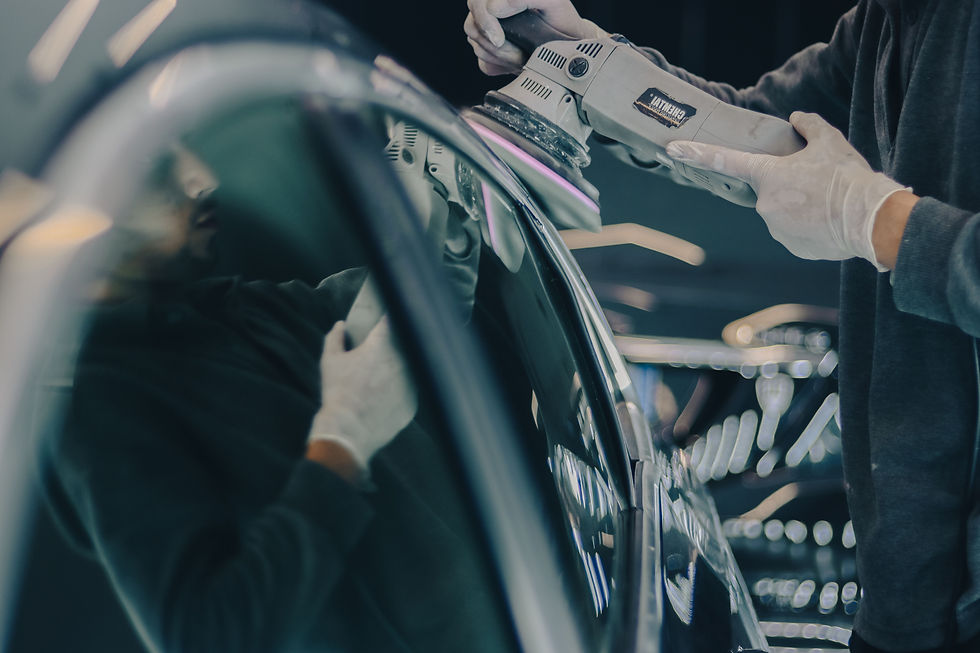 Close shot of polishing machine being used on a car