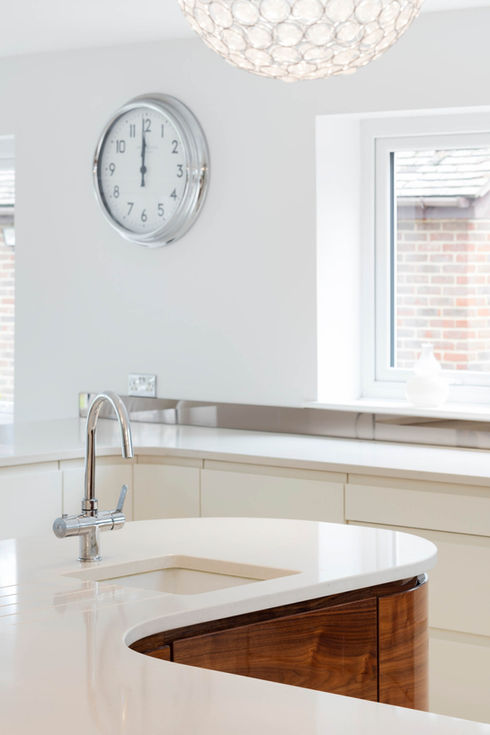 Custom made kitchen island with walnut cabinetry.