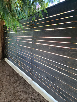 Custom exterior wood staining fence, Squamish BC.