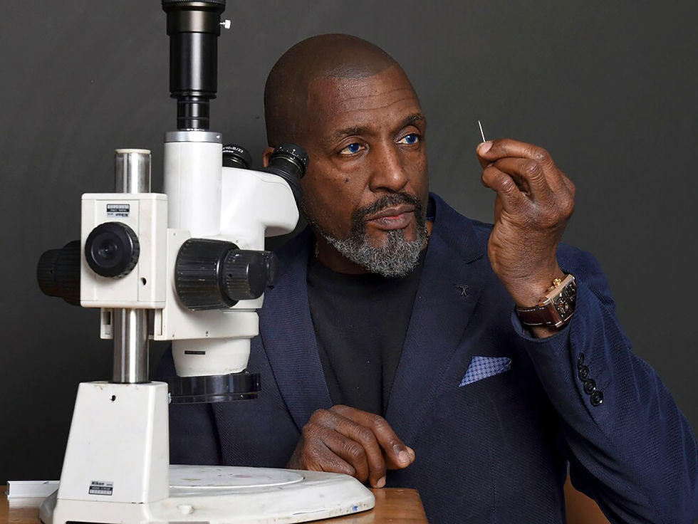 Willard looking through a needle eye
