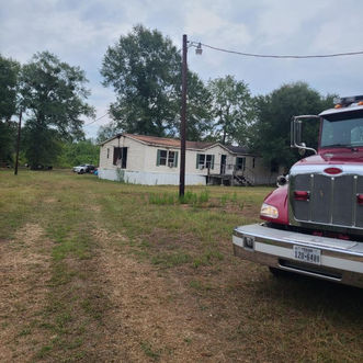 Double wide suffered heavy damage to the rear