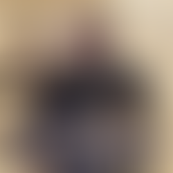 What do the coins on Veteran graves mean?