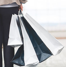 Person Holding Bags