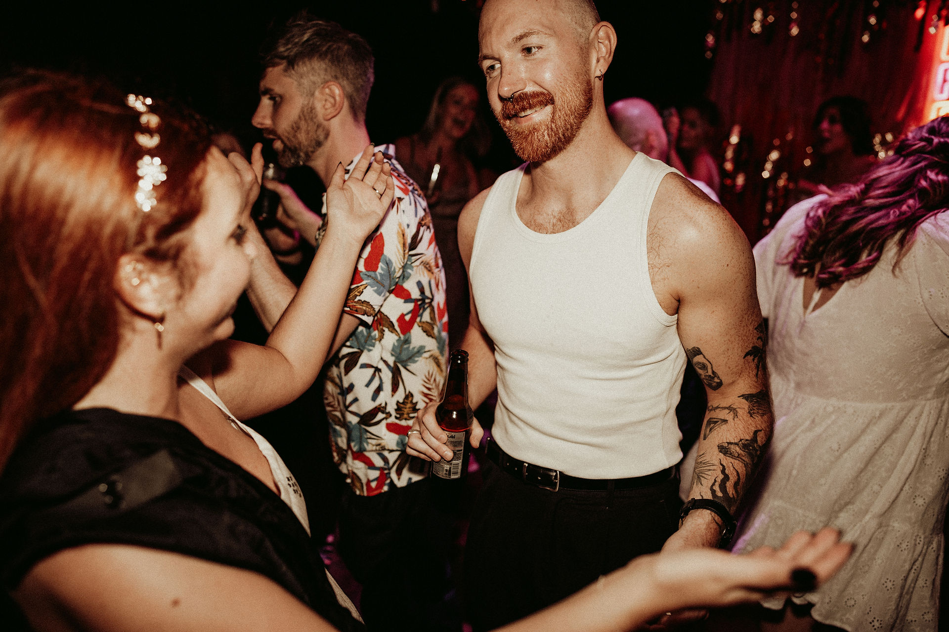 Alternative bride and groom at their non-traditional wedding reception in London