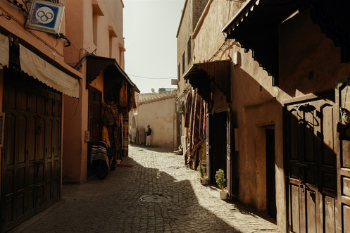The streets of Marrakech early in the morning while shops were opening and the sun was rising
