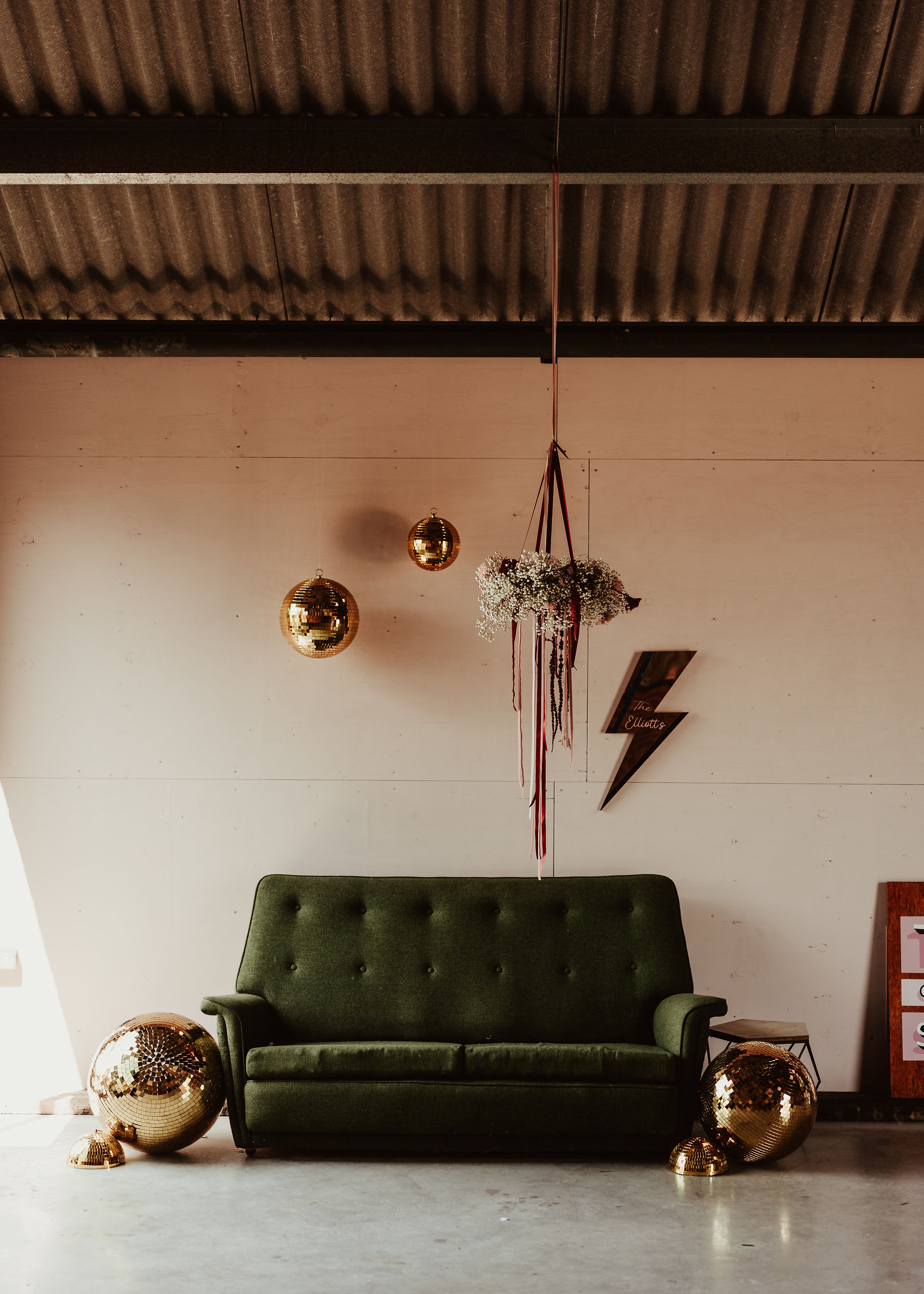 Disco styled wedding decor at the couples alternative wedding venue The Giraffe Shed