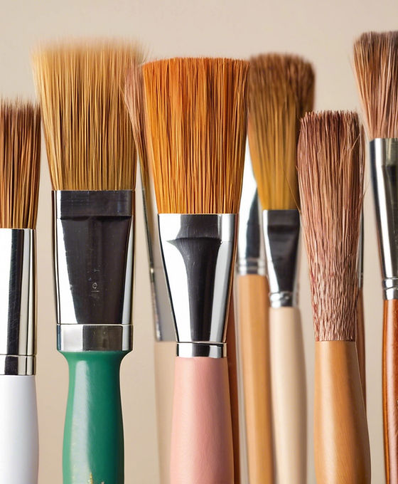 paint brushes with colorful neutrals on them.jpg