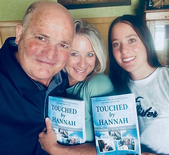 Three us holding book.jpg