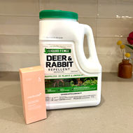 On a kitchen counter is a white jug of Liquid Fence Deer & Rabbit Repellent beside a small peach-colored box labeled "Collagen Night Wrapping Mask." They arrived together in the same box during last week's Amazon Prime Days.