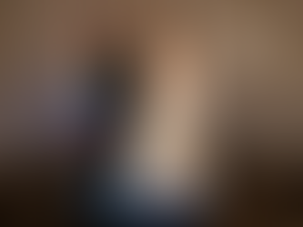 A couple standing on the 360 booth platform