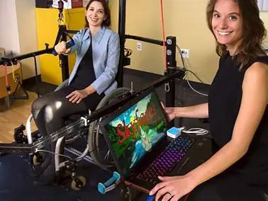 An image of Christina and her co-worker demoing their Skyfarer technology.