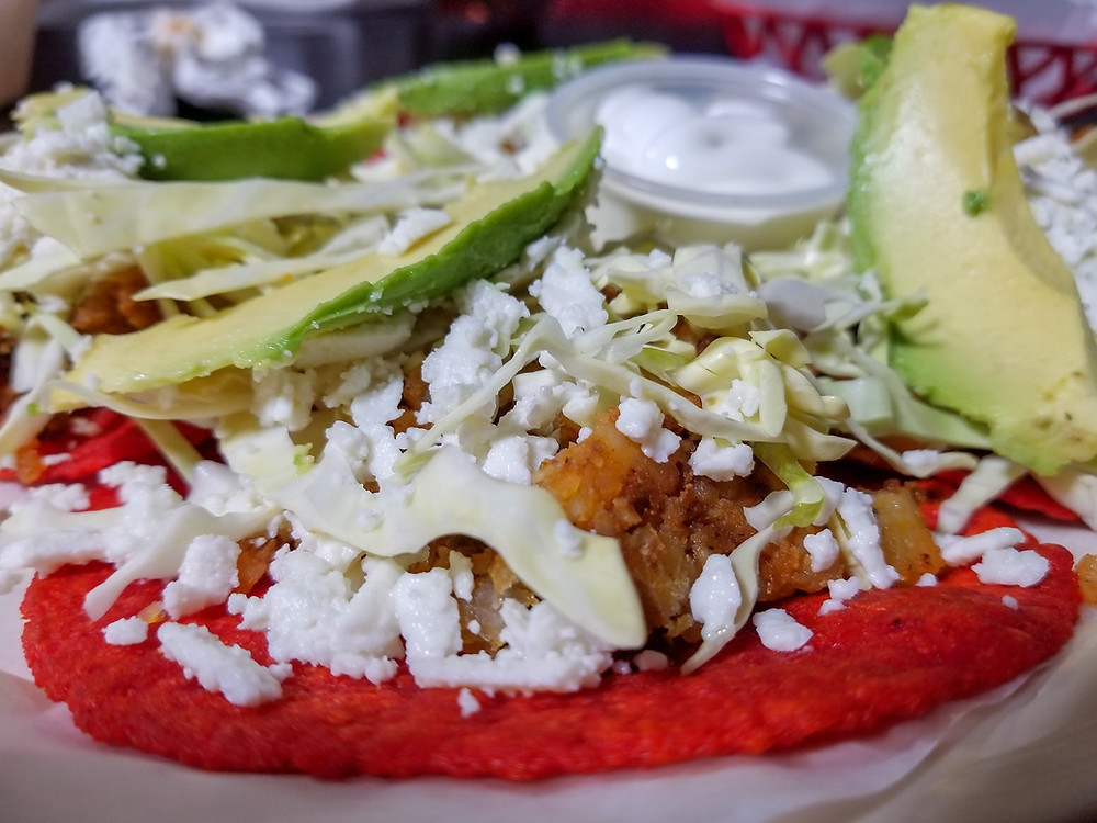 Close up of tacos potosinos.