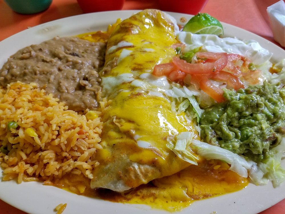 The Jalisco burrito spans the width of your plate.