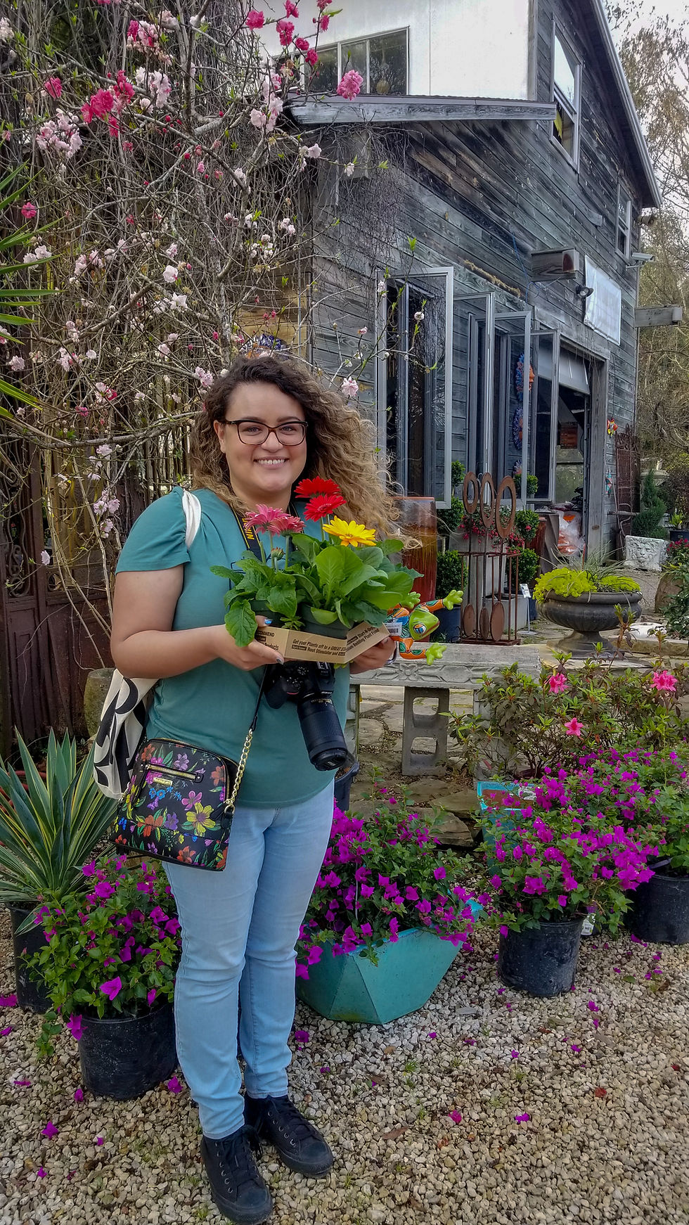 Paloma and the daisies at Maas Nursery in Seabrook, Texas