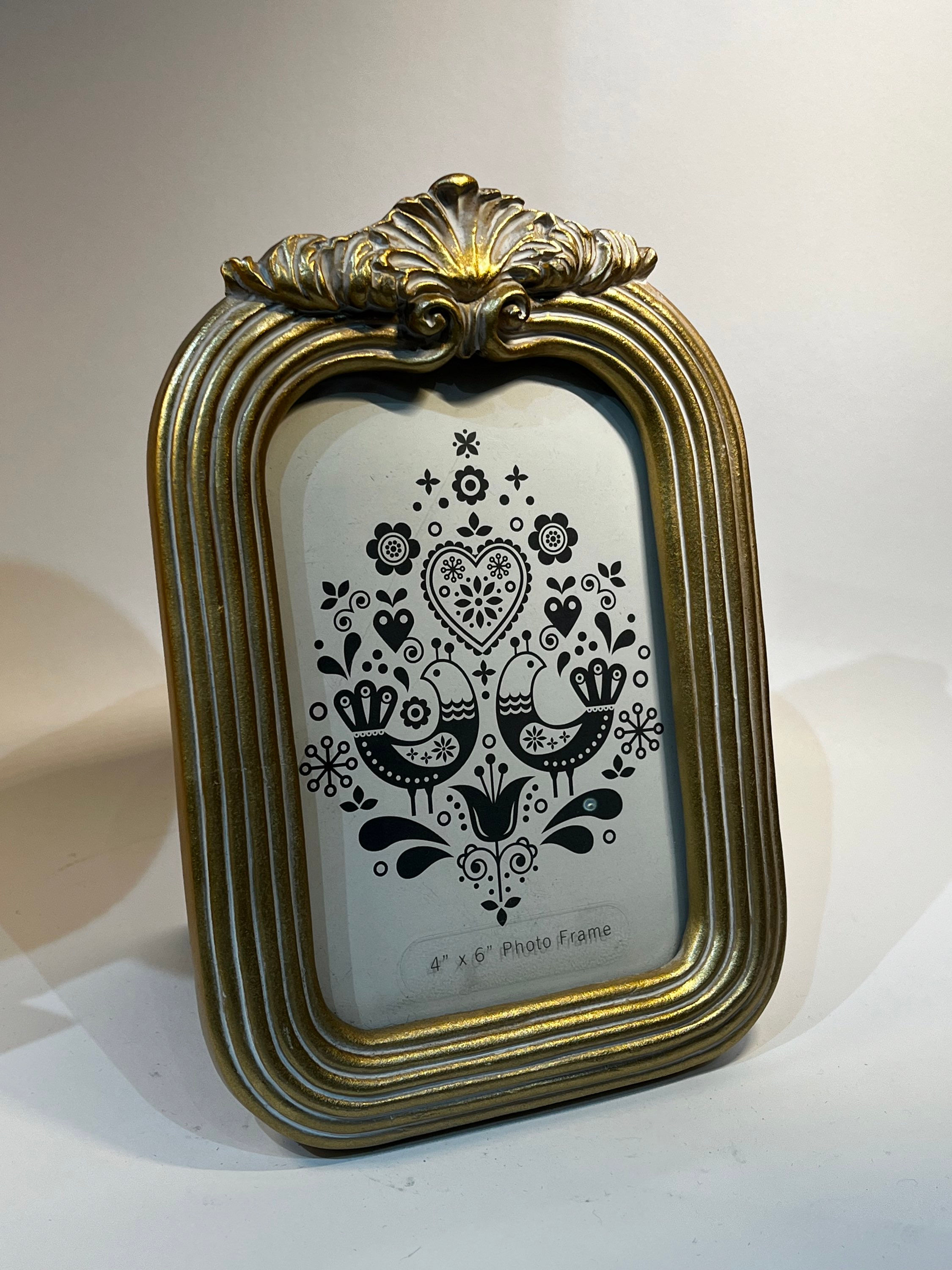 Porta retratos dorado 