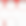Abstract image of blurred red circles on a white background creating a soft bokeh effect.