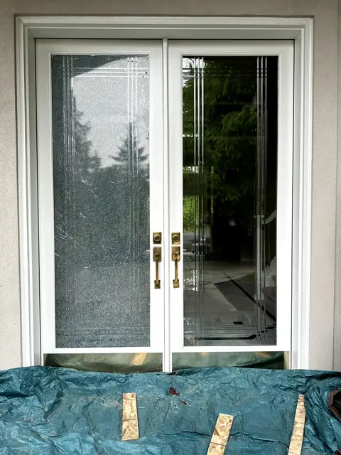 french glass doors with one side needing repair