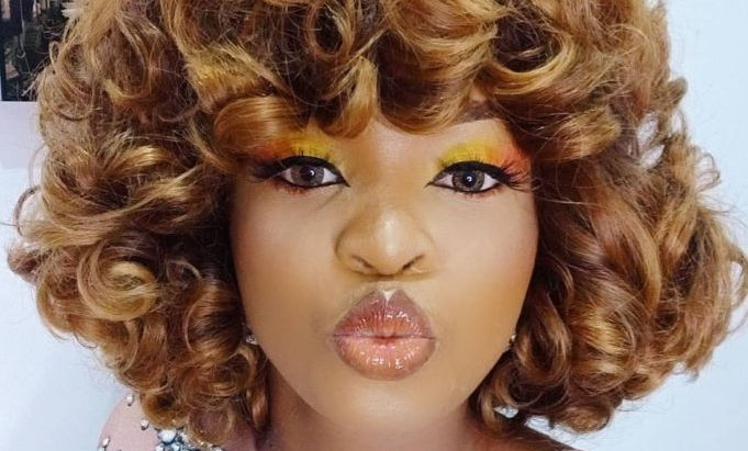 After threatening to sue for damages, Cindy Okafor apologizes for not tagging her dress donors