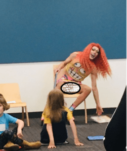 Drag Queen in skirt exposes