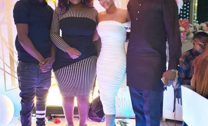 Toke Makinwa screams for joy as Naira Marley shows up at her birthday dinner party (Video)