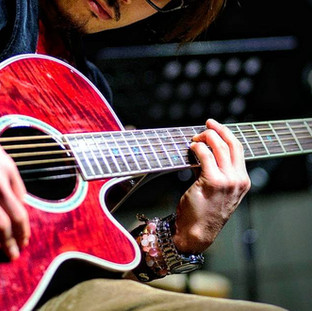 ギタリストTaka