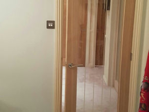 Oak panelled door fitted on a landing area