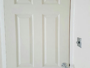 Cream panelled door fitted with a mortice lock