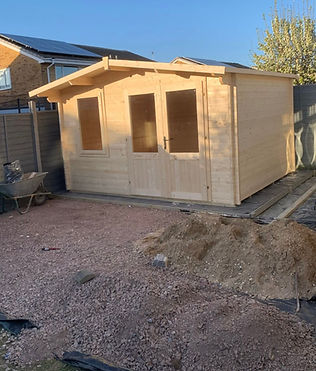 A partially built wooden shed
