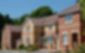 A row of modern suburban houses with red brick and beige siding, surrounded by neatly trimmed shrubs and trees