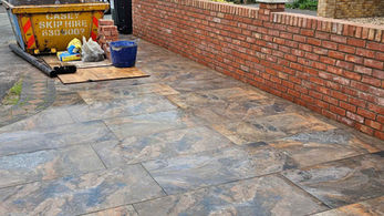 Newly paved patio showing large, patterned stone tiles
